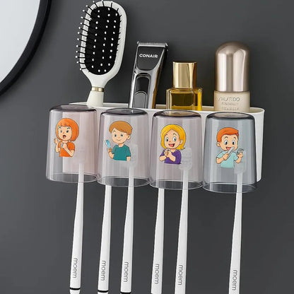 Clear toothbrush holder with cartoon characters holding toothbrushes against a dark wall.
